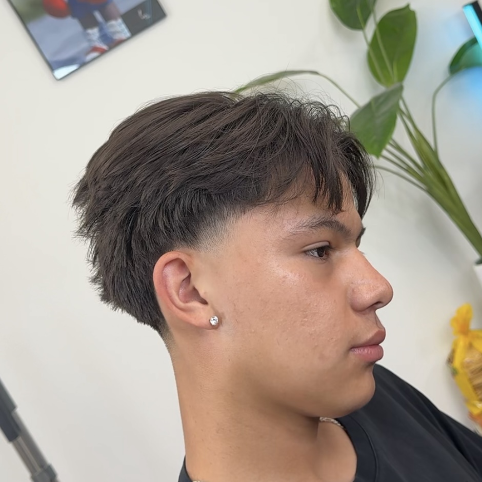 Long top taper fade haircut, side profile