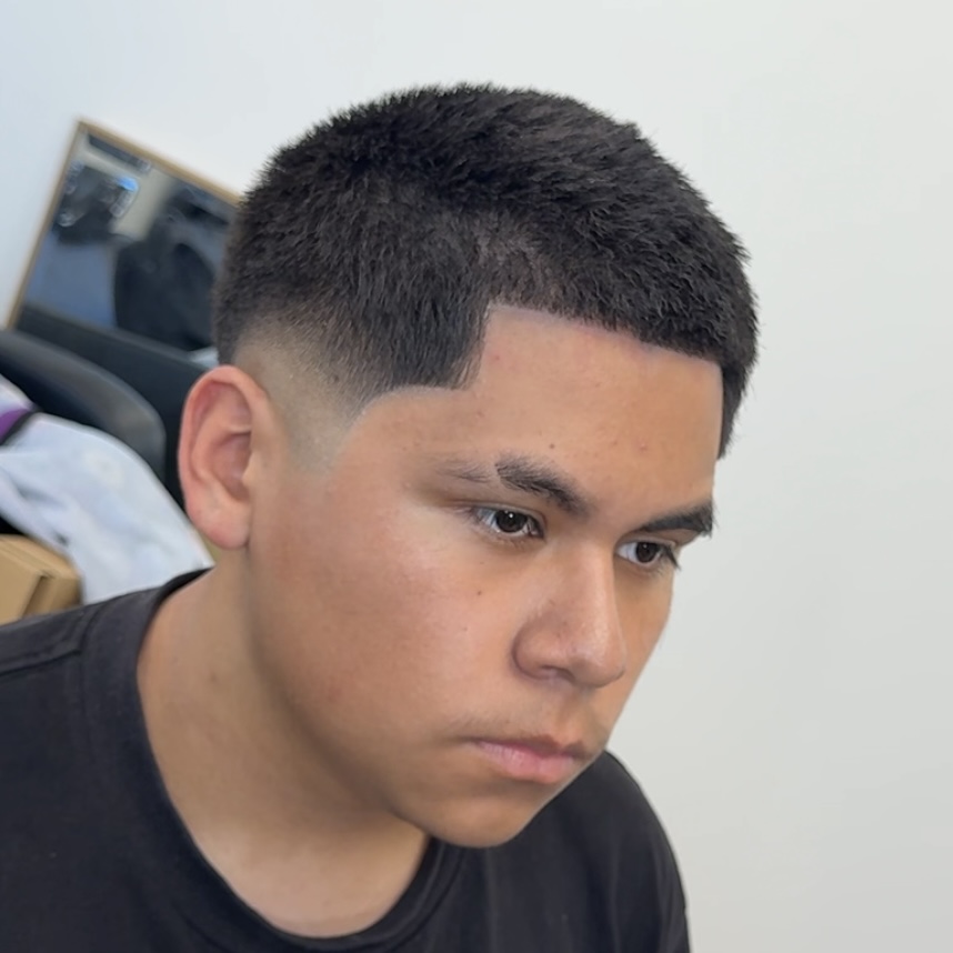 Close-up of a precision fade haircut in progress at Vanish Cutz